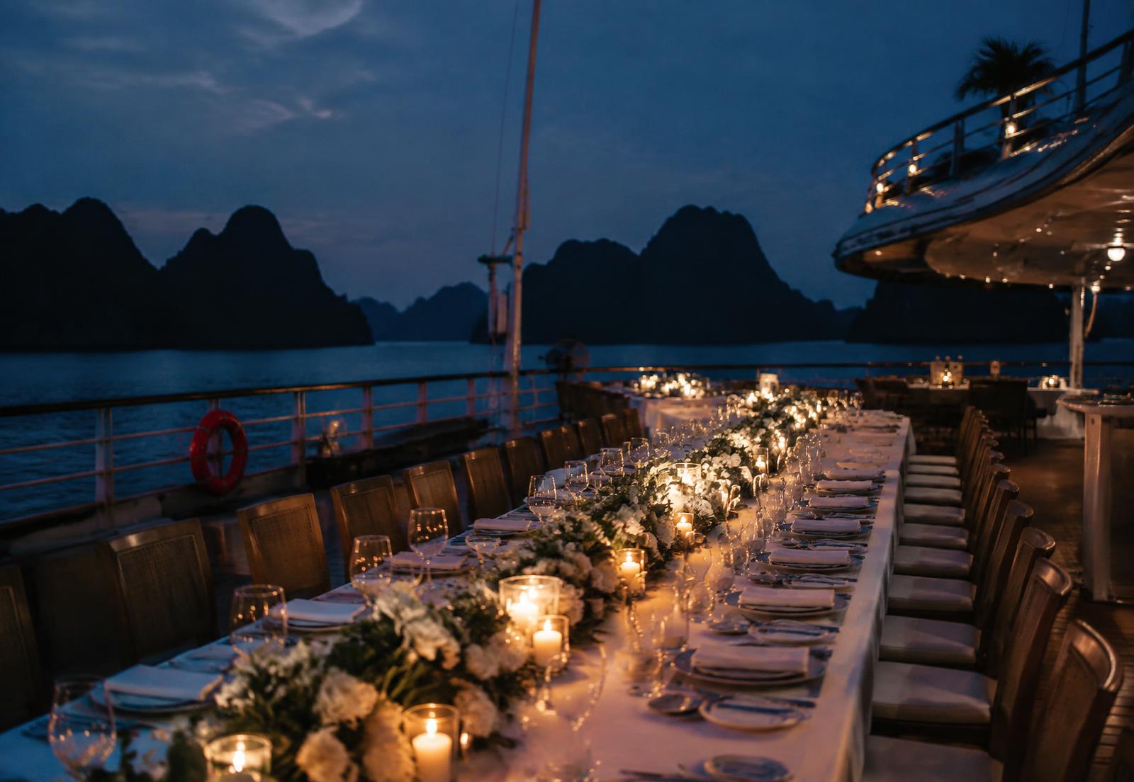 Candlelit wedding dinner on deck